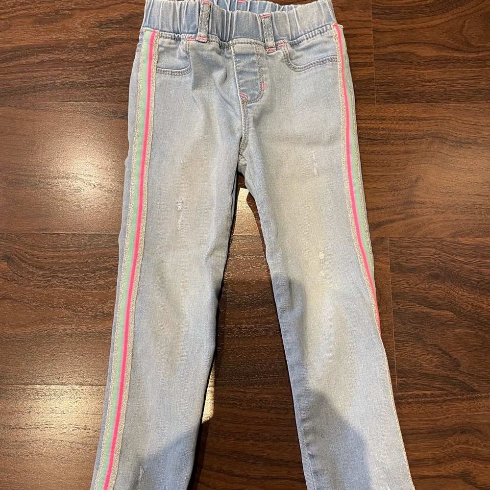 Distressed jean legging style.